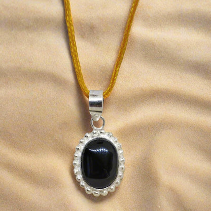 BLACK HAKIK WITH PENDANT